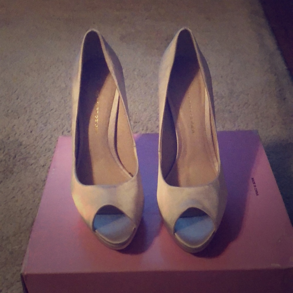 Cream foreign a half inch heels only worn once